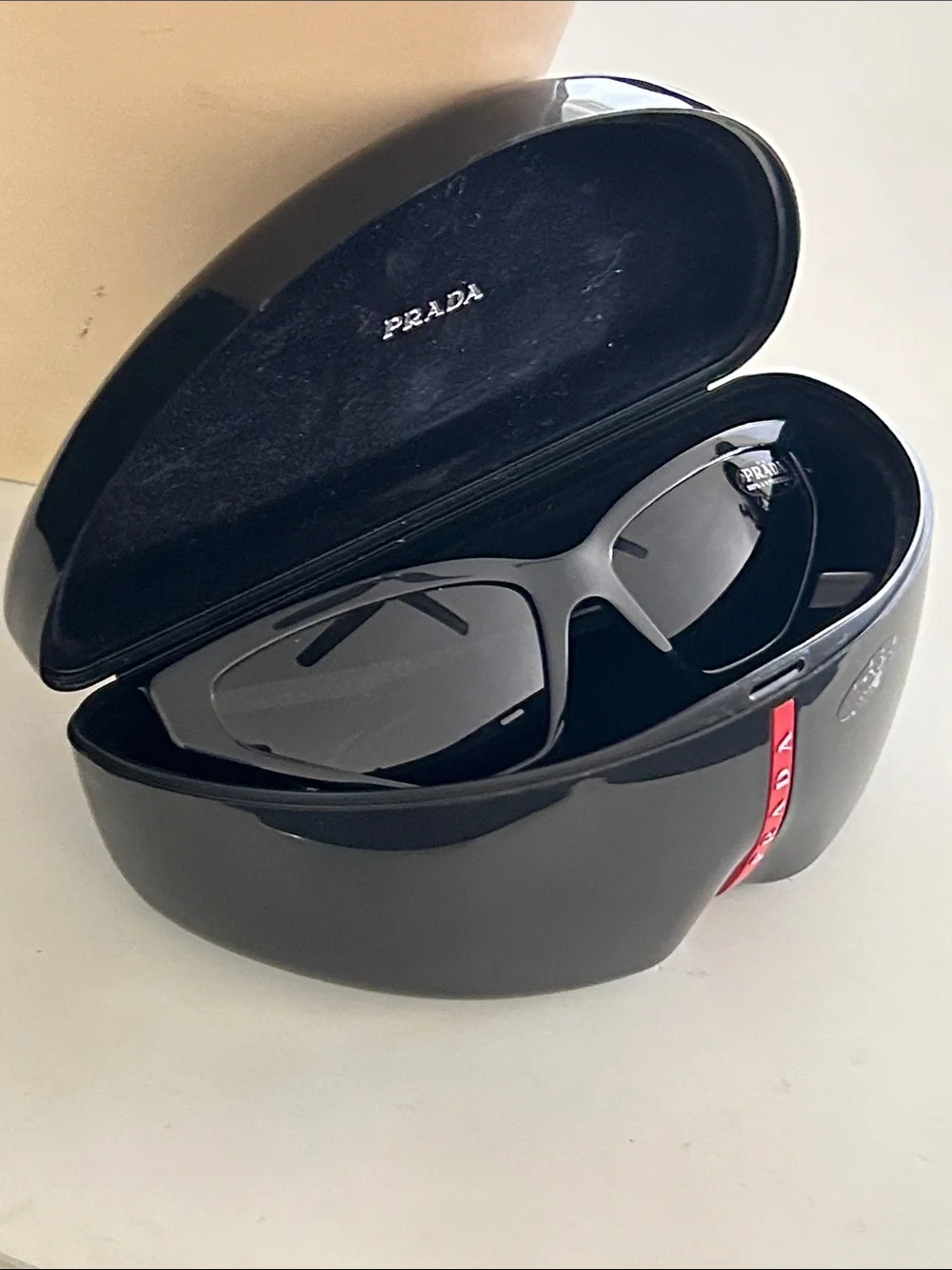 Prada Black Cat-Eye Sunglasses for Women with Logo Temples